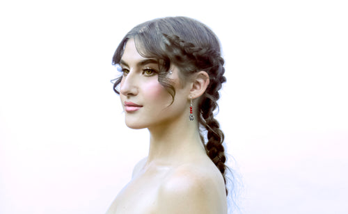 Beautiful Peruvian woman wearing 950 sterling silver earrings by Coqui Perez | Peruvian Fashionistas