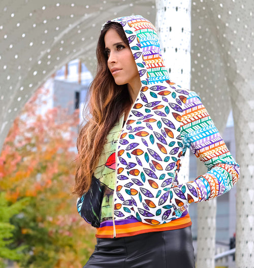 A Peruvian female model showing the front of the Summer Breeze Hooded Graphic Jacket | Peruvian Graphic Jacket